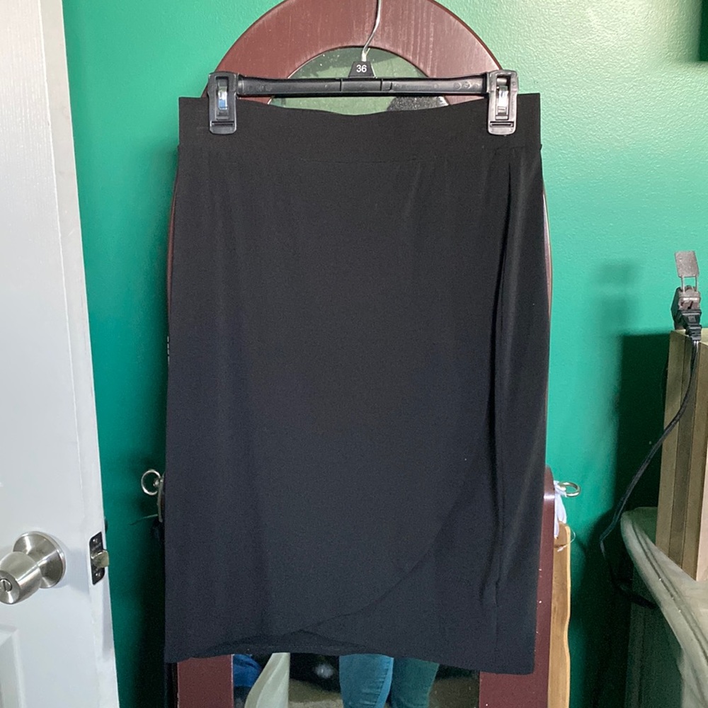 Cute Black skirt- knee length on a 5’6” woman